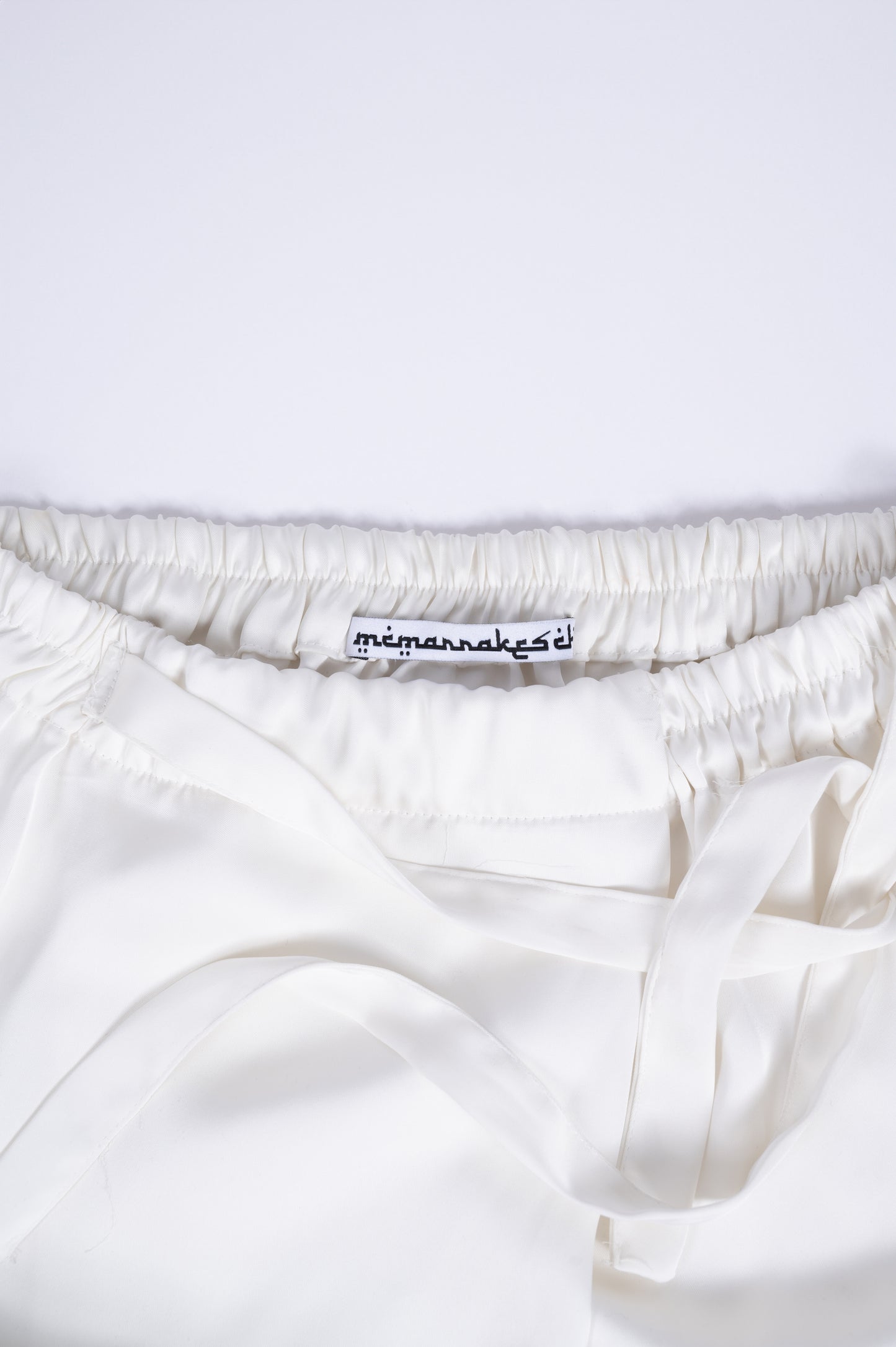 asymmetrical rabat pants white